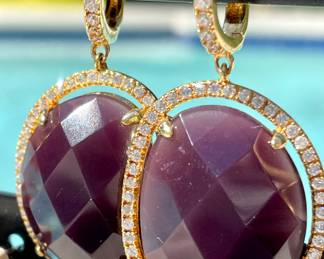 $38; Sterling pierced earrings with purple stones