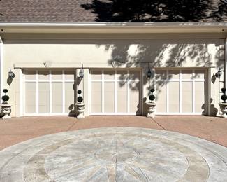 $350 each (6 available); 18d x 25h; concrete draped urns