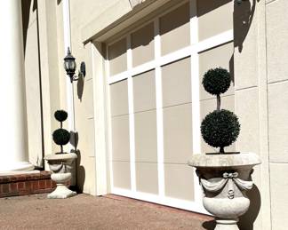 $350 each (6 available); 18d x 25h; concrete draped urns