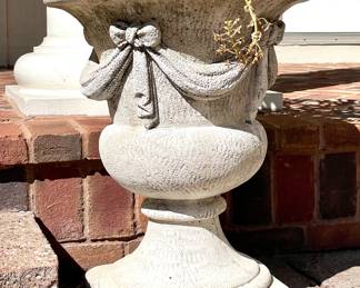 $350 each (6 available); 18d x 25h concrete draped urns; close up view