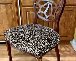 $150; 24 x 21 x 40; animal print upholstered side chair with painted gold accents