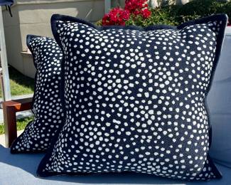 $24 each (four available); navy blue and white pillows