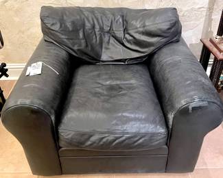 $350; 44 x 39 x 33; Crate and Barrel black leather, oversized, well-loved chair