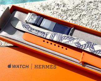 $260; two Hermes bands for Apple Watch, orange rubber and blue infinity 
