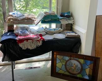 Tableclothes, napkins, placemats etc. Antique stained glass window