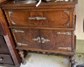 A collection of furniture in the garage that we just didn't have room for. Several nice pieces and some fixer uppers