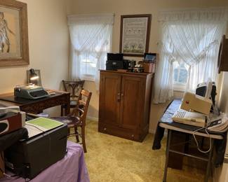 Electronic room - typewriters, computer, early Apple computer, desks, nude charcoals