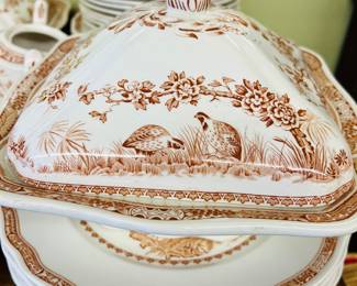 Brown and white ironstone dinnerware in Quail pattern.