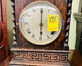 Nice Barley twist oak mantel clock circa 1910.