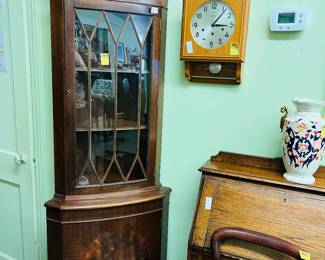 Nice Petite mahogany corner cabinet.