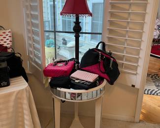 Round Mirrored End Table & Women's Handbags