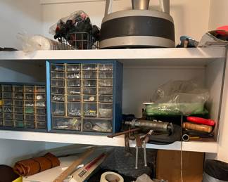 Stool, Boxes of nuts/bolts, Grease Guns, Saws, Clamps