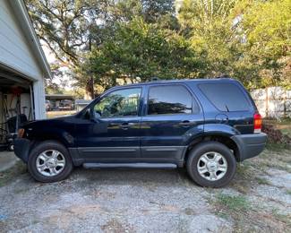 2003 Ford Escape XLT V6 with Sunroof. Clean vehicle. Has brand new battery. Will start but needs a fuel pump. 169,426 miles. 