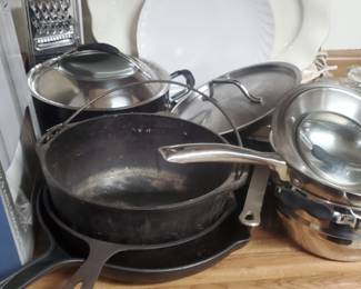 Lots of cast iron pans 