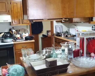 The kitchen is running over with new and old kitchen Ware