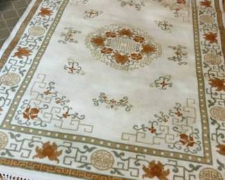 Oriental inspired area rug