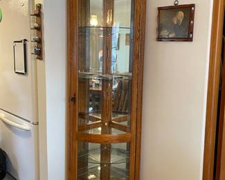 Oak corner curio cabinet