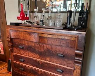 Solid wood dresser, several crystal decanters, wine opening devices, and liquor decanter with matching stem ware