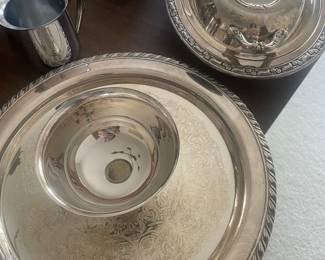 Silver serving pieces. 