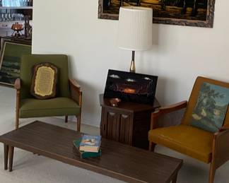 MCM chairs, art, and the coffee table expands! 