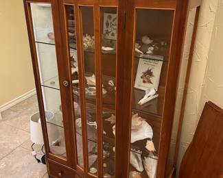 Beautiful vintage curio cabinet filled with sea shells!
