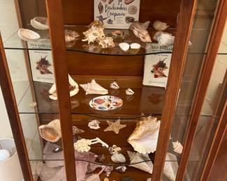 Has drawers at the bottom.