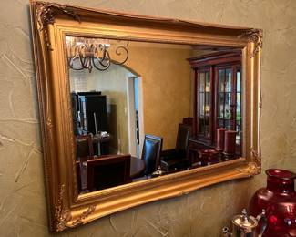 Long formal beveled glass mirror