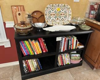 Short bookcase filled with COOKBOOKS!