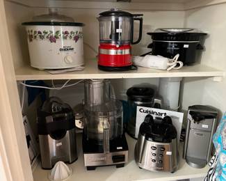 Top: Rival crock Pot, KitchenAide, Hand mixer & crock pot.
Bottom: Cuisinart juicer, processor, blender & can opener