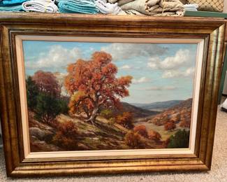 The second one. Dollie was a talented & renowned artist who studied for years with Texas landscape artist J.F. McCan.