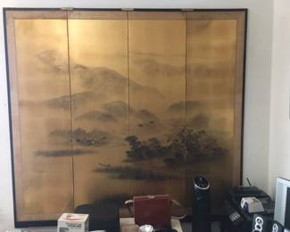 Wall mounted folding screen