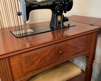 Antique Singer sewing machine, inset in table
