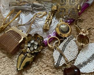various costume jewelry, post earrings, brooches, tie clips