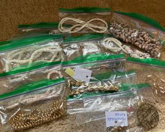various costume jewelry, necklaces
