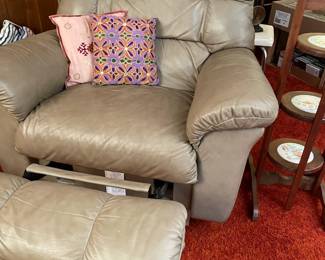 Leather recliner and throw pillows, floor lamp