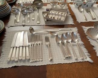 Silverware and serving utensils, table linens