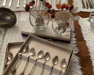 Silverware and serving utensils, table linens