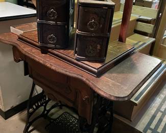 antique sewing machine and decorative boxes