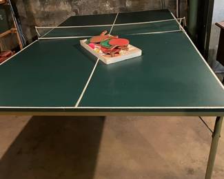 ping pong table and paddles
