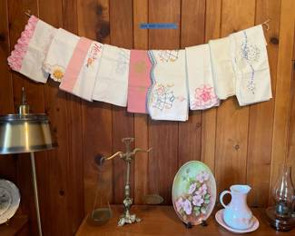 vintage wood furniture, embroidered linens, vintage and antique china dishes, bowls, decor, baskets, brass floor lamp