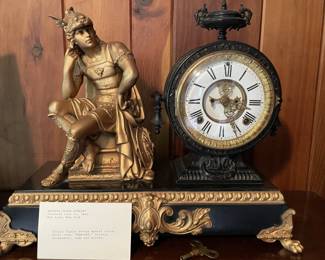 antique hardwood chest of drawers, embroidered wall art, antique decorative clock with statue, 1881, antique mirror with bronze figurine