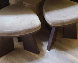Few padded fabric wrapped stools for dining room table