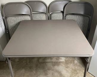 Beige Folding Table and Four Chairs
