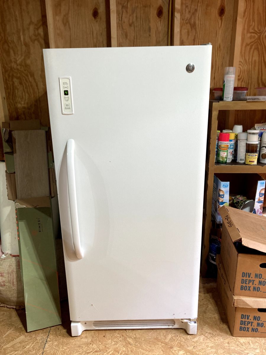 New GE Freezer 60in tall 28wide 28deep