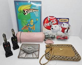 (2) A Hip Original - Hawaii Lava Tiki Bottle Opener.  1987 DC The Greatest Superman Stories Ever Told Paperback Book.  1999 Matchbox Coca Cola Dad & Son's Mustang.  Coach Brown/Burgundy Monogram Canvas Wristlet.  Juicy Couture Silver Trifold Wallet & Zip Pencil Case.