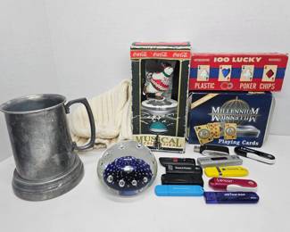 Vintage Playboy Steel Mug w/ Glass Bottom.  White Winter Hat.  Coca Cola Musical Collection Ice Skating Polar Bear.  Vintage 100 Lucky Plastic Poker Chips.  10-Piece Thumbdrive Lot.  Intaglio Anton Blue Glass Paperweight.  Mundi Millenium Limited Edition Playing Cards Tin.