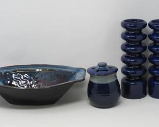Art Pottery raised side bowl. Can be used for low heat baking.  Pottery open slot top; 2 cobalt candle sticks (see details on auction gallery) 