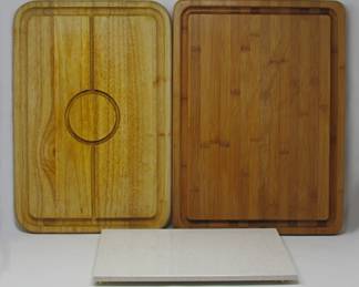 stone, bamboo and wood cutting/serving boards