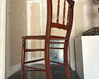 wooden chair with cane seat