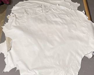 Six White Cabretta Leather Skins